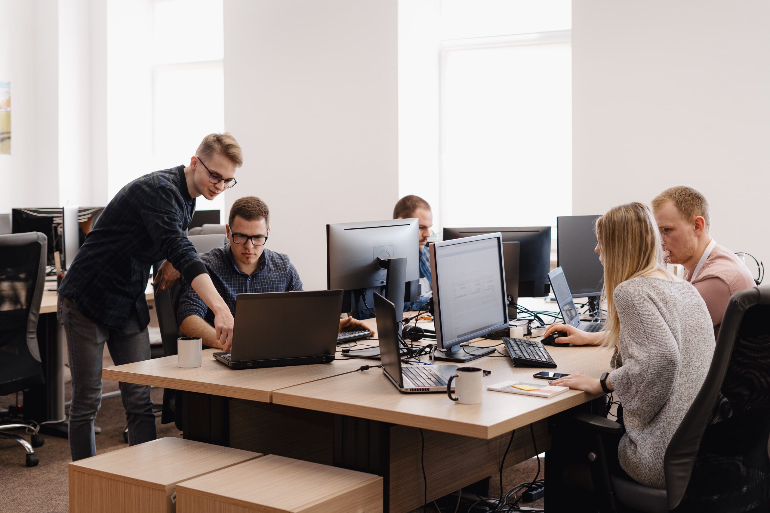 group-young-business-people-working-office-min